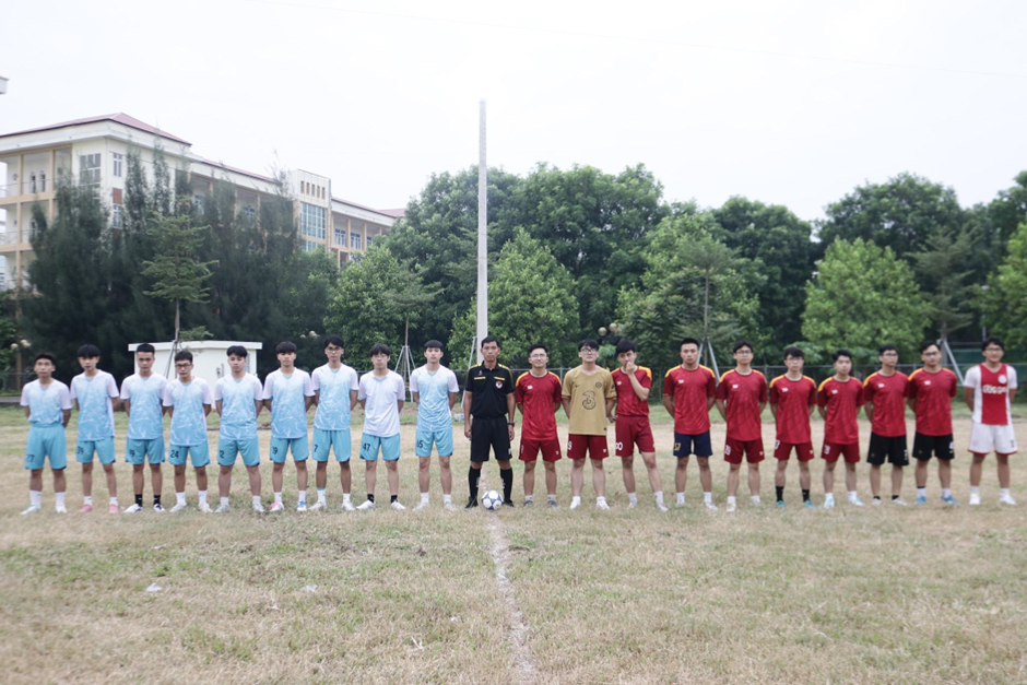 A group of people in uniform standing in a line

Description automatically generated